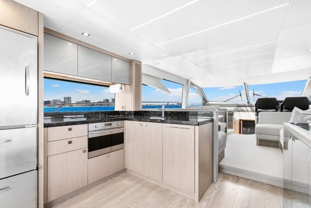 70ft SunSeeker Done Deal Miami fully equipped galley with sleek modern finishes