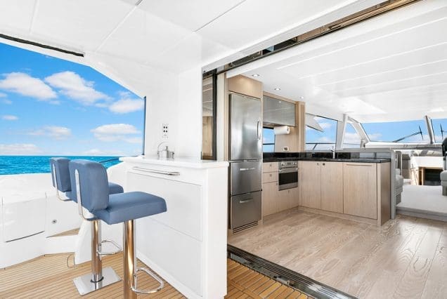 70ft SunSeeker Done Deal Miami fully equipped galley with sleek modern finishes