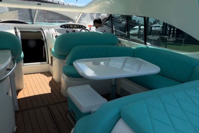 Luxury 60ft Tiffany Sunseeker Miami elevated lounge offering panoramic views of Biscayne Bay and the Miami skyline