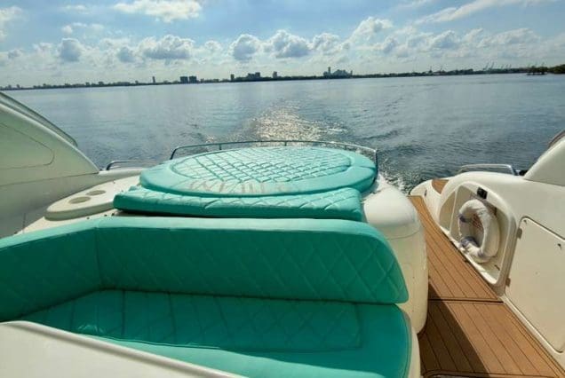 Luxury 60ft Tiffany Sunseeker Miami upper deck designed for open-air relaxation and luxury cruising