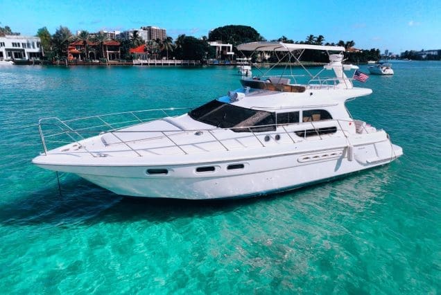 50ft Monaco SEALINE Miami bow lounge area with breathtaking views of Biscayne Bay and the Miami skyline