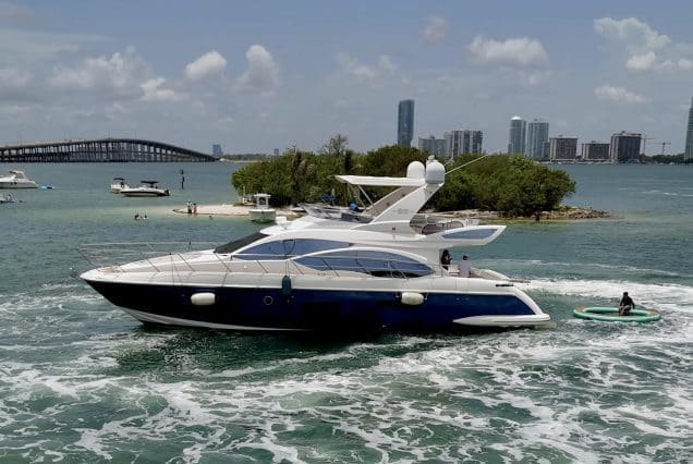 Azimut 55ft Azure Miami bow lounge area with breathtaking views of Biscayne Bay and the Miami skyline