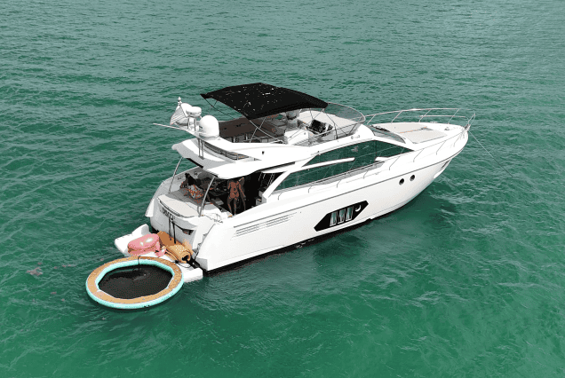 Absolute 60ft Disco Miami spacious swim platform with direct access to the water