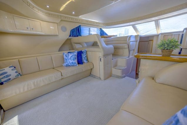 Sea Ray 45ft Sea Daze Miami elegant indoor salon with plush seating and contemporary décor